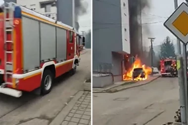 DRAMA U LOZNICI! Automobil gori pored zgrade, ljudi beže od vatre! (VIDEO)