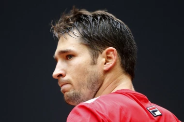 Dominik Tim prejak za Lajovića