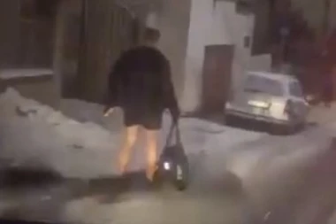 Ovo nije realno! Pogledajte ovog tipa kako šeta po snežnom kijametu u sred Beograda!