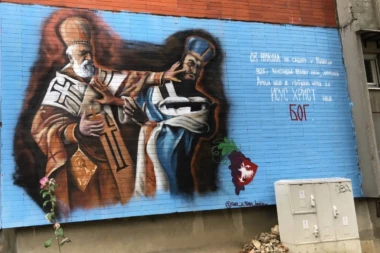 (FOTO) Neobičan grafit osvanuo na Banjici: Sveti Nikola naučio jeretika pameti