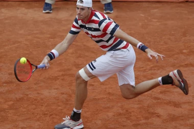 SRBIN ISPAO U MADRIDU! Izner u drugom kolu