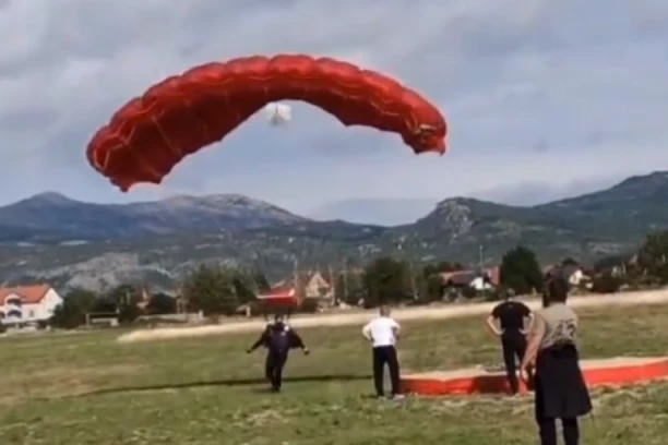 POGLEDAJTE KAKO EPISKOP METODIJE SKAČE PADOBRANOM! (VIDEO)