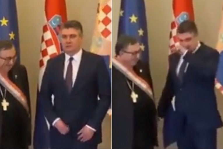MILANOVIĆ ZAKOPČAVAO ŠLIC PRED KAMERAMA, A ONDA OBRISAO NOS RUKOM: Neviđen blam hrvatskog predsednika i to tokom odlikovanja