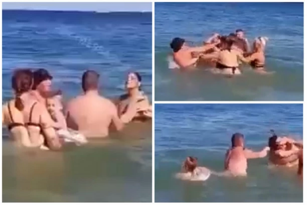OVDE NI AJKULE NE BI SMELE DA SE UMEŠAJU! Jeziv snimak tuče u moru, odrasli se biju, dete ostaje samo! (VIDEO)