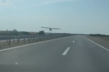 SHOCKING SCENE NEAR BELGRADE! The plane was flying right above the vehicle! (VIDEO)