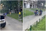 LUDA POTERA U SRED BEOGRADA: Motociklom kroz zgradu! (VIDEO)