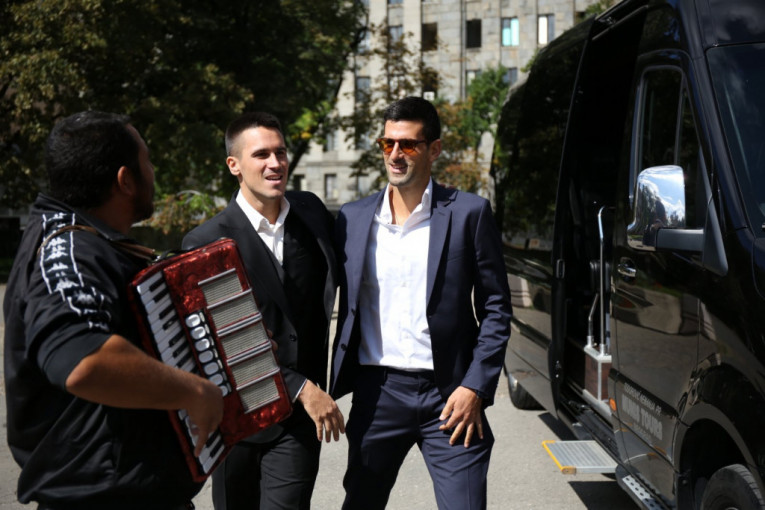 Novak Đoković i Đorđe Đoković se vesele