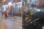 PRVI SNIMAK NAKON JEZIVE NESREĆE U BEOGRADU: Telo mladića na trotoaru, očevici pokušavaju da mu pomognu (VIDEO)