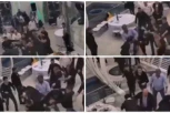NE ZNA SE KO KOGA UDARA, LETE FLAŠE, SEVAJU PESNICE! Objavljen snimak masovne tuče na Ledinama: Bili se oko muzike! (VIDEO)