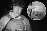 RUSI TVRDE DA JE LIKVIDIRAN AMERIČKI SPECIJALAC! Jeziv snimak iz Bahmuta: Prigožin pozira pored tela vojnika i pokazuje isprave (VIDEO)