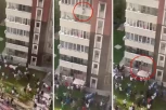 DECU BACAJU KROZ PROZOR ZBOG VATRE! Pogledajte dramatičan snimak POŽARA u višespratnici: SKOK je bio jedina nada (VIDEO)
