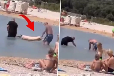 KO BI SE OVOGA DOSETIO? Natakli prase na ražanj, pa ga potopili u more da ga osole (VIDEO)