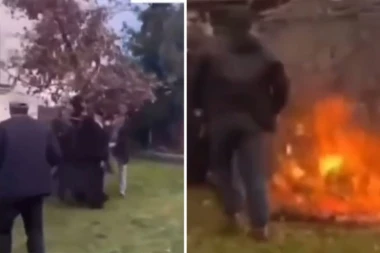 SVEŠTENIK UMALO UPAO U VATRU SA BADNJAKOM! Snimak postao hit na internetu - "Vladika Jovan skoro izgore"! (VIDEO)