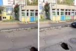 DETE, BEZ PROBLEMA, U NJU MOŽE DA UPADNE! Pogledajte kolika se rupa otvorila na kolovozu ispred vrtića u Zemunu! (FOTO)