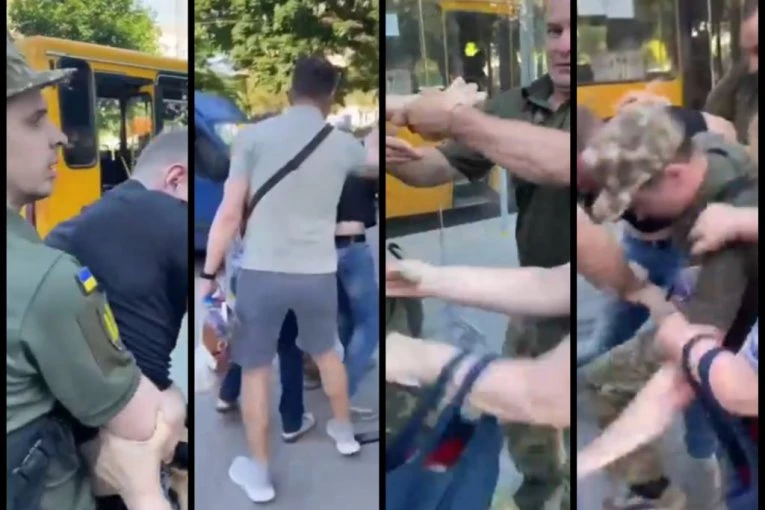 ŠOKANTAN SNIMAK IZ DNJEPROPETROVSKA! Ukrajinci otimaju SINA majci da ga odvedu na RATIŠTE! Cika i vriska, nastao je HAOS! (VIDEO)