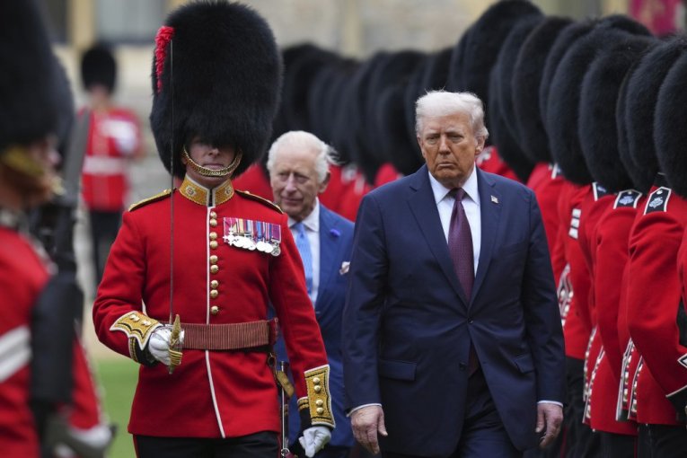 Tanjug/AP Photo/Kirsty Wigglesworth, Poo