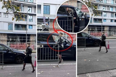 KORAČA DUGIM KORAKOM, DUŽE OD POLA SATA ČEKALA VOZAČA! Po Miljkovićevu ženu došao crni džip! (FOTO)