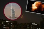GORI SIMBOL DUBAIJA! Iranski projektili pogodili Burdž Al Arab, krvavi ljudi beže sa aerodroma! IMA POVREĐENIH! (VIDEO)
